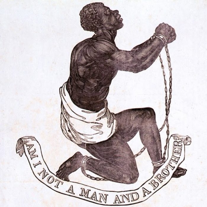 The abolitionist medallion showing a kneeling chained man above the motto “Am I not a man and a brother?”