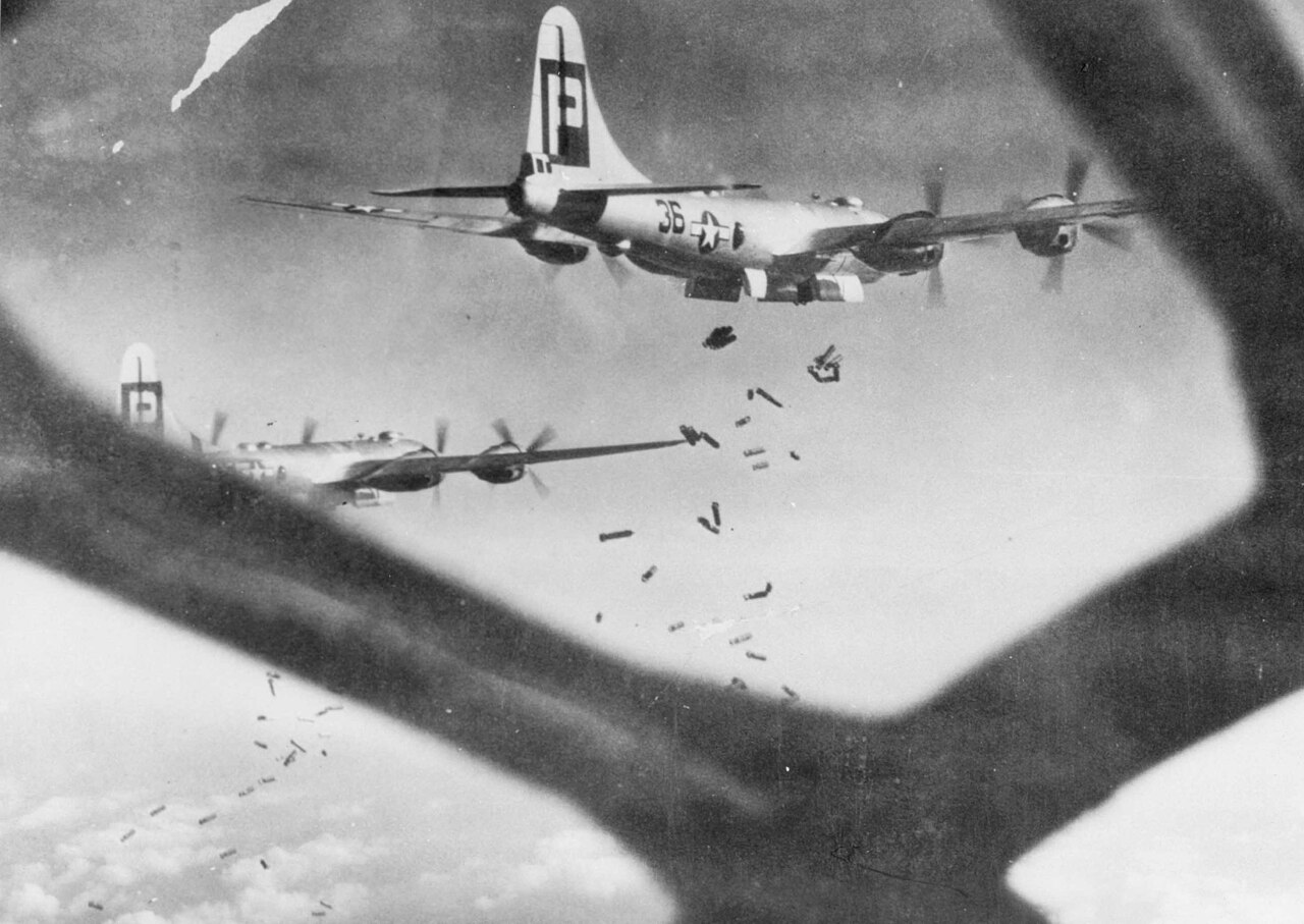 Two B-29 Superfortresses seen from the cockpit of a third aircraft in flight