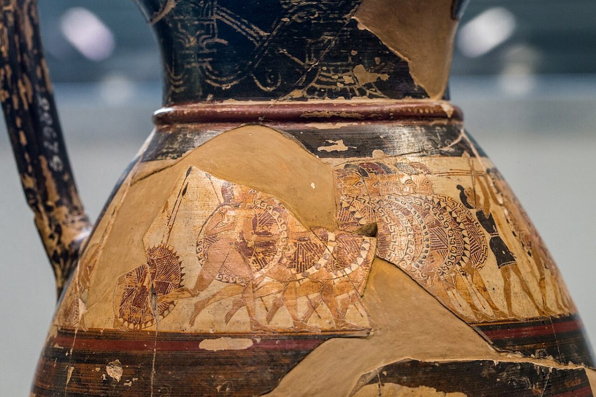 A detail of the Chigi vase showing two ranks of Greek hoplites with round decorated shields and spears advancing toward each other